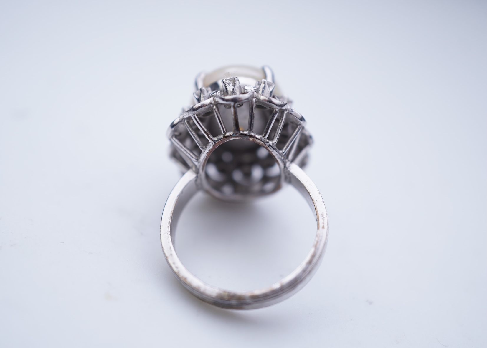 An opal and diamond cluster ring